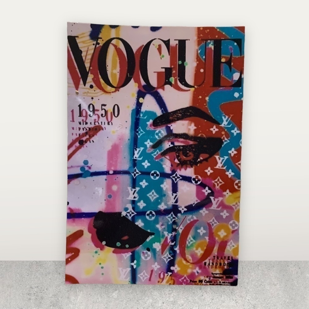 VOGUE reprint on high quality glossy paper framed in black with glass 4x6”‌‌‌‌